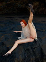 Gorgeous Redhead Janey Spreading Her Long Legs To Bare Her Shaved Pussy To The Elements