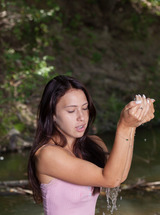 Melania Splashing Herself So Her Wet Shirt Clings To Her Perky Breasts Alluringly