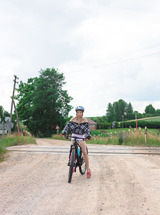 Mirka Cycles Through Belarussian Countryside Exposing Perky Nipples And Gloved Fingers Teasing Her Shaved Pussy photo 03