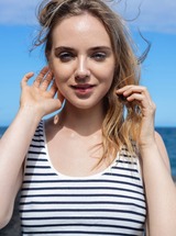 Oxana Chic Teases On The Beach photo 00