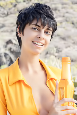 Kensi Dressed In A Bold Orange Crop Top That Hugs Her Perfect Breasts And A Matching Mini Skirt