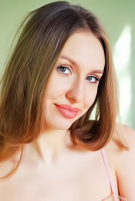 Lia Pink Kneels To Offer An Enticing Rear View Of Her Voluptuous Booty