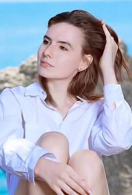 Nika Smiling With Pleasure As The Stimulating Ocean Breeze Caresses Her Sexy Body