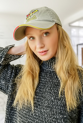 Dana Red With Strawberry-blonde Hair Lounging Naked In An Armchair