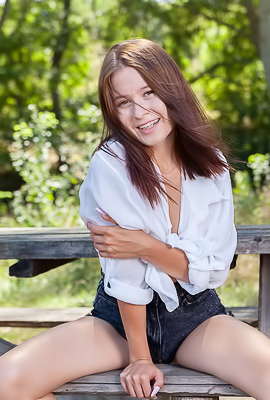 Skye Bloom Perching On A Picnic Table In The Park