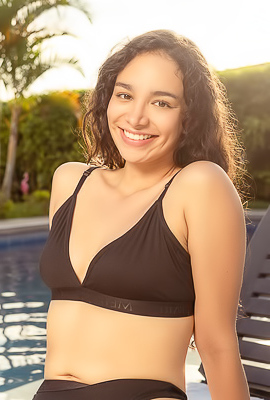 >Saray Bound Latina Brunette Basks In The Sun’s Golden Glow