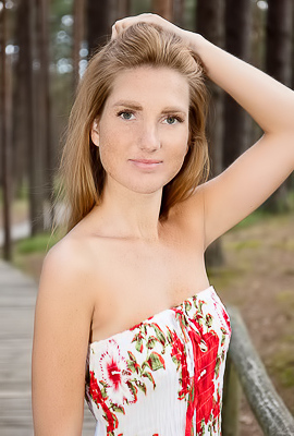 >Lera F Teases With Long Locks And Shaved Allure In The Forest With Tantalizing Upskirt Views
