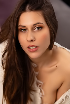 >Amber Slassh Teases With Perky Nipples And Spread Legs On The Couch