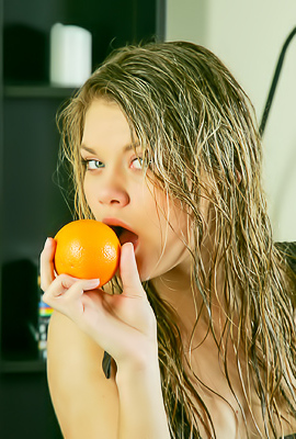 >Lisa Entices With Her Alluring Smile And Wet Dream Look As She Undresses
